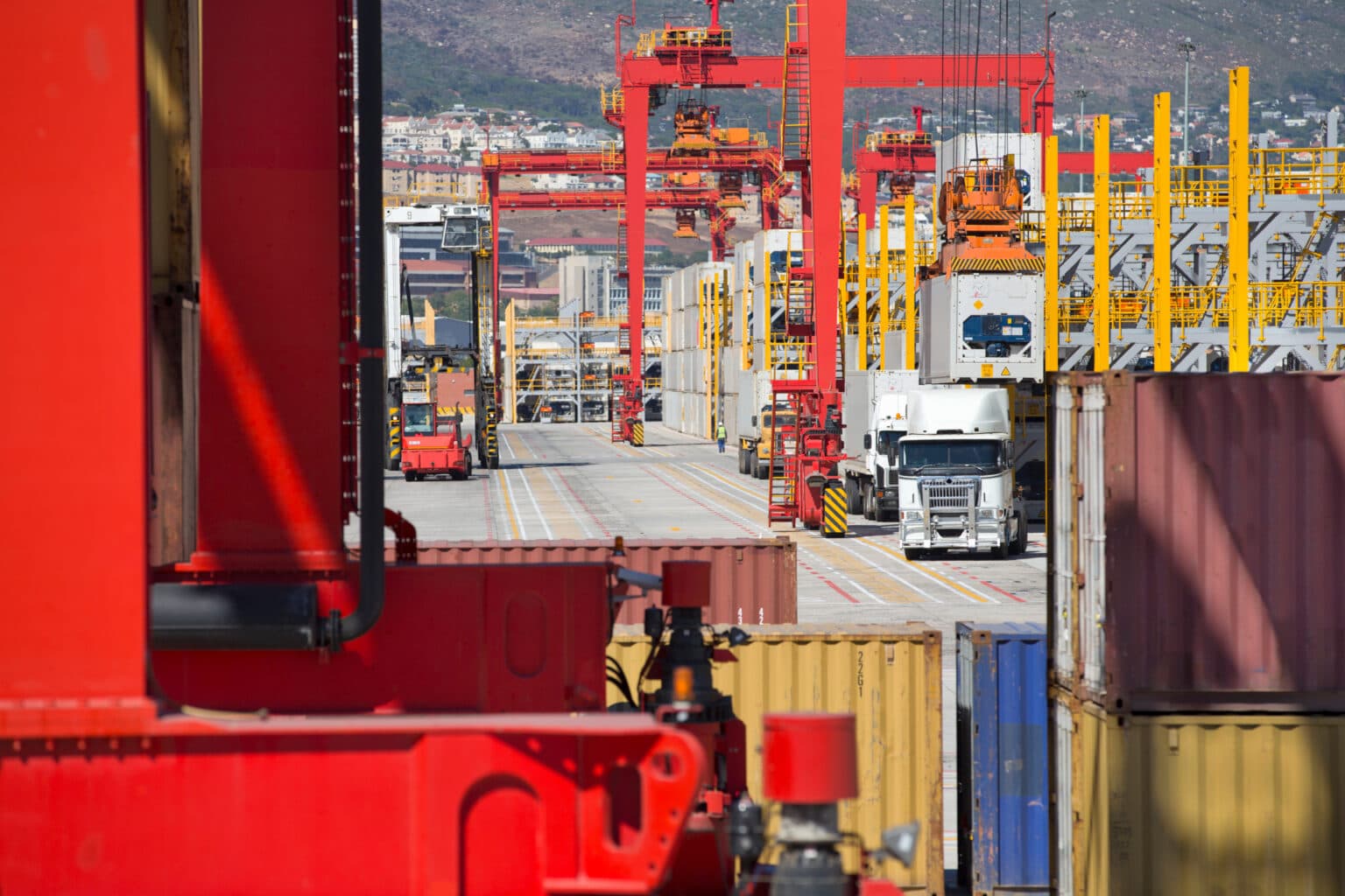 Cranes loading cargo containers at an international shipping port